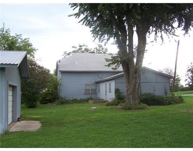 Exterior Back/Side. large shade trees  3 mature pe