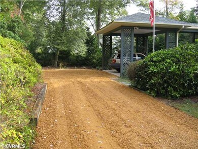 Exterior Front - New gravel ddrivewayand concrete 
