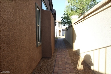 View of side of property with stucco siding