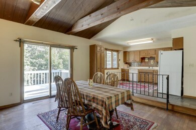 A view of the kitchen from the dining area.