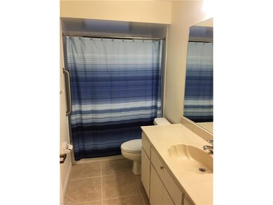 HANDICAPPED GUEST BATHROOM WITH BATHTUB AND SHOWER