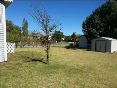 Huge back yard with storage shed