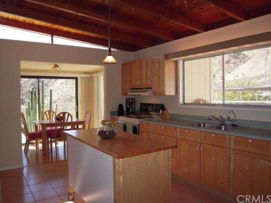 QUAIL HOUSE. VIEW FROM KITCHEN INTO DINING ROOM.