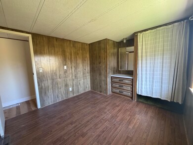 2nd bedroom with closet and builtin