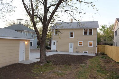 Back of house.  Yard is fenced. New patio