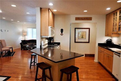 Updated kitchen with custom cabinets and quartz co