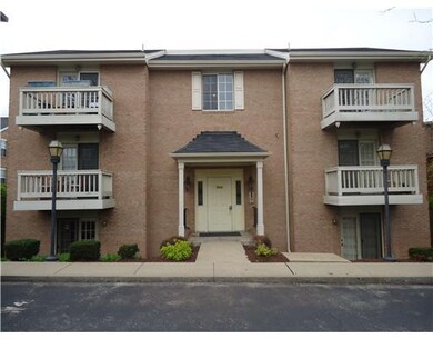 Exterior Front. Back entrance from parking lot