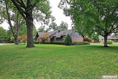 SITUATED ON A WELL MANICURED, CORNER CUL DE SAC LO