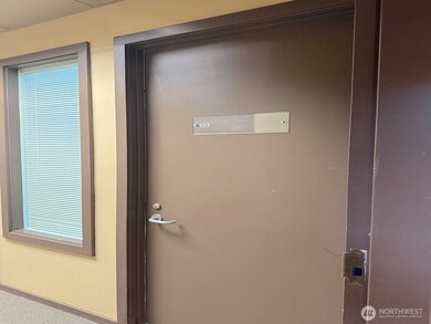 Interior hallway entrance to Suite 103.