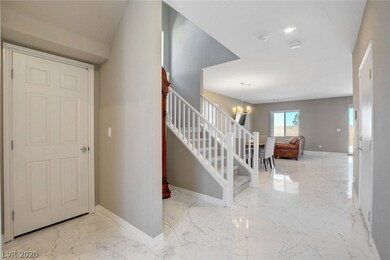 Just inside front door. Beautiful low maintenance