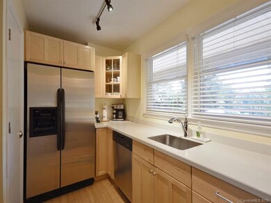 Updated kitchen with Corian countertops and stainl