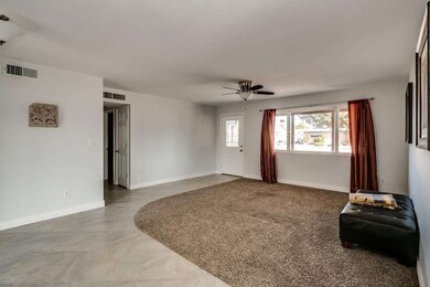 Great Room w/ New Carpet and Tile
