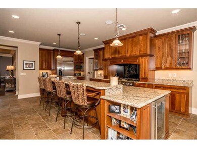 Kitchen. The gourmet kitchen offers a spectacular 