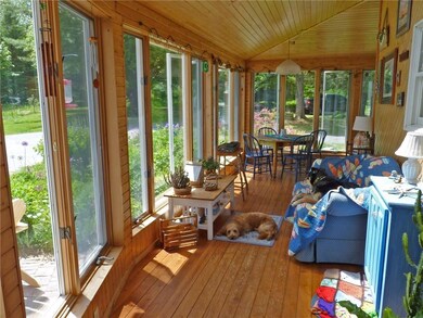 Spacious wrap around 4 season sun room