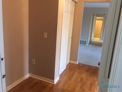 Welcoming entrance into this secure upper unit.