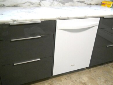 7) Kitchen: Newer Dishwasher.