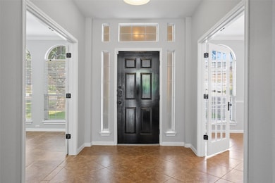 Views of the front door and bright entryway.