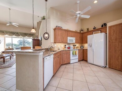 Open floor plan and vaulted ceilings make entertai