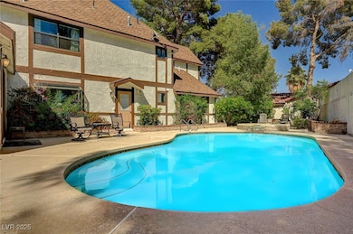 Pool with fence and a patio