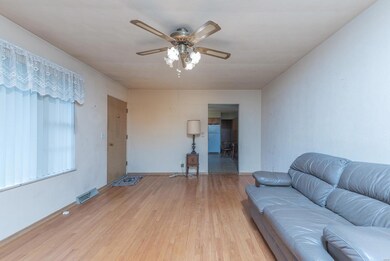 Living Room looking into the kitchen/dining room