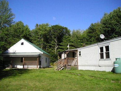 Covered patio on back of garage