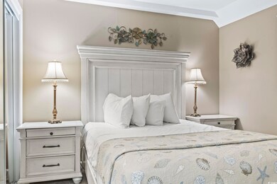 Bedroom with lofted ceiling