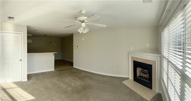 Livingroom looking into kitchen area
