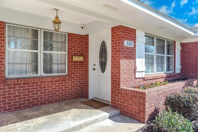 View of exterior entry featuring visible vents and