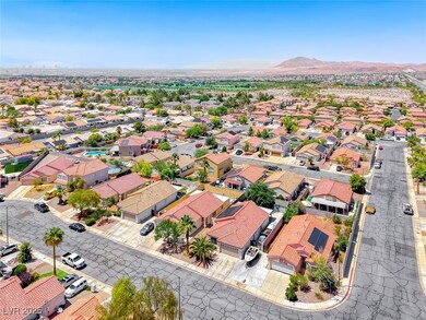 Aerial view of residential area with mountains