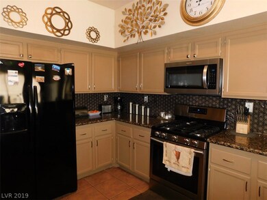 Kitchen view of freshly painted cabinets and brand