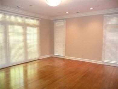Large Master Bedroom down has hardwood flooring, 2