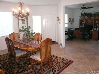 Tile floor entry into parlor/dining room.