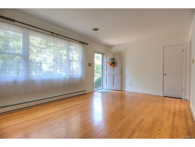 Large picture window in living room makes it a bri