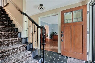 Recently renovated entry boasts a gorgeous craftsm