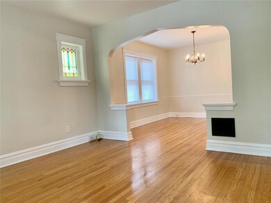 Living room looking into dining room. Original sta