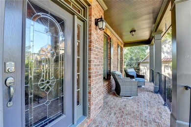 Porch featuring a balcony