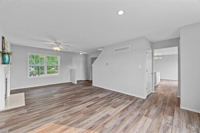 The entry way has a coat closet to the right of th