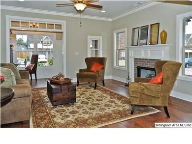 View from the dining room into the living room. **