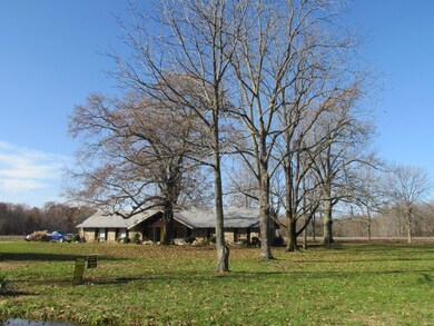 Enjoy the privacy of this home and acreage