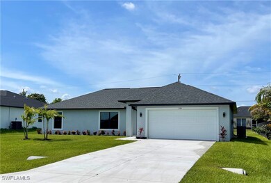 Ranch-style home featuring a garage, central air c