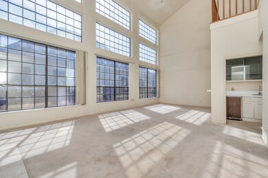 Enjoy the natural light in this spacious living ar
