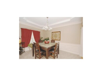 909 Dogwood Dr, Raymore, MO 64083 - photo 2