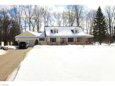 Two-car attached garage plus additional parking/tu