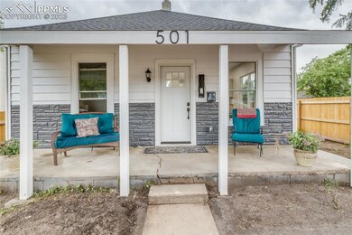Super cute and cozy covered front porch