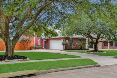 Beautiful oaks on this large corner lot!