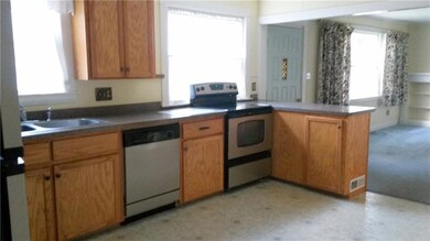 Kitchen with refrigerator,...