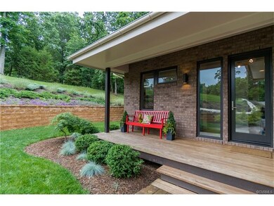 Charming covered front porch. Note the professiona