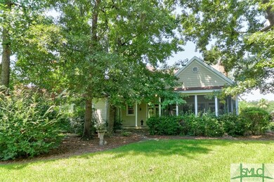 View of the screened in porch and covered patio.
