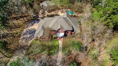 Drive up to your dream home on approx 5 acres with separate living quarters and individual shop