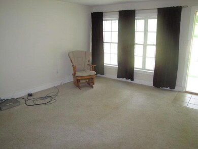 Large windows allow ample natural light.